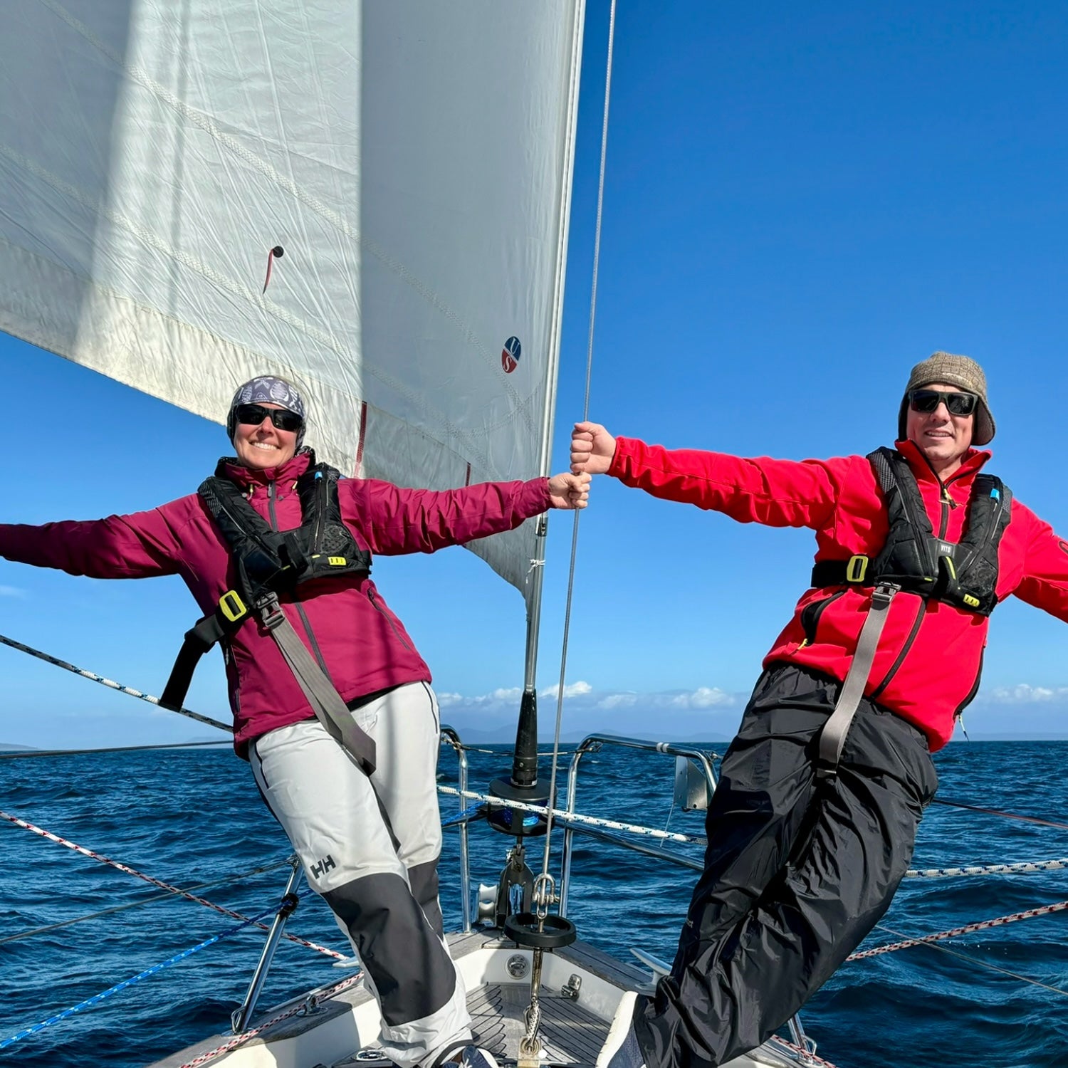 Julie and Gio - Captains and ABYC-certified technicians behind Pelagic Blue Cruising