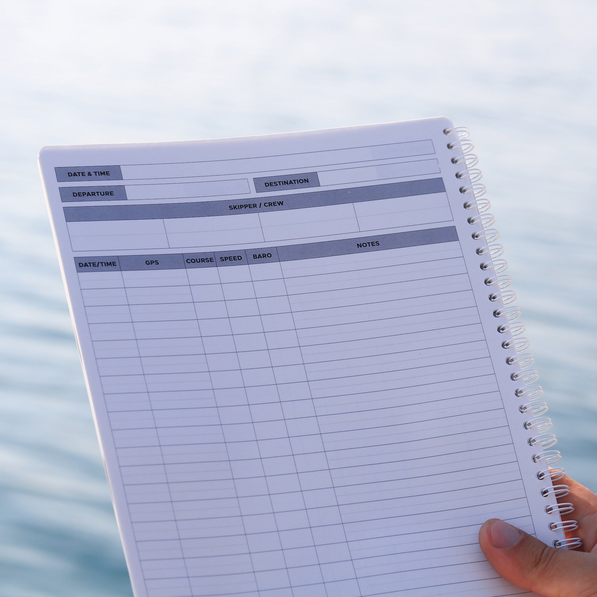 Close-up of updated sailing log pages showing GPS, speed, barometric pressure, and note fields.