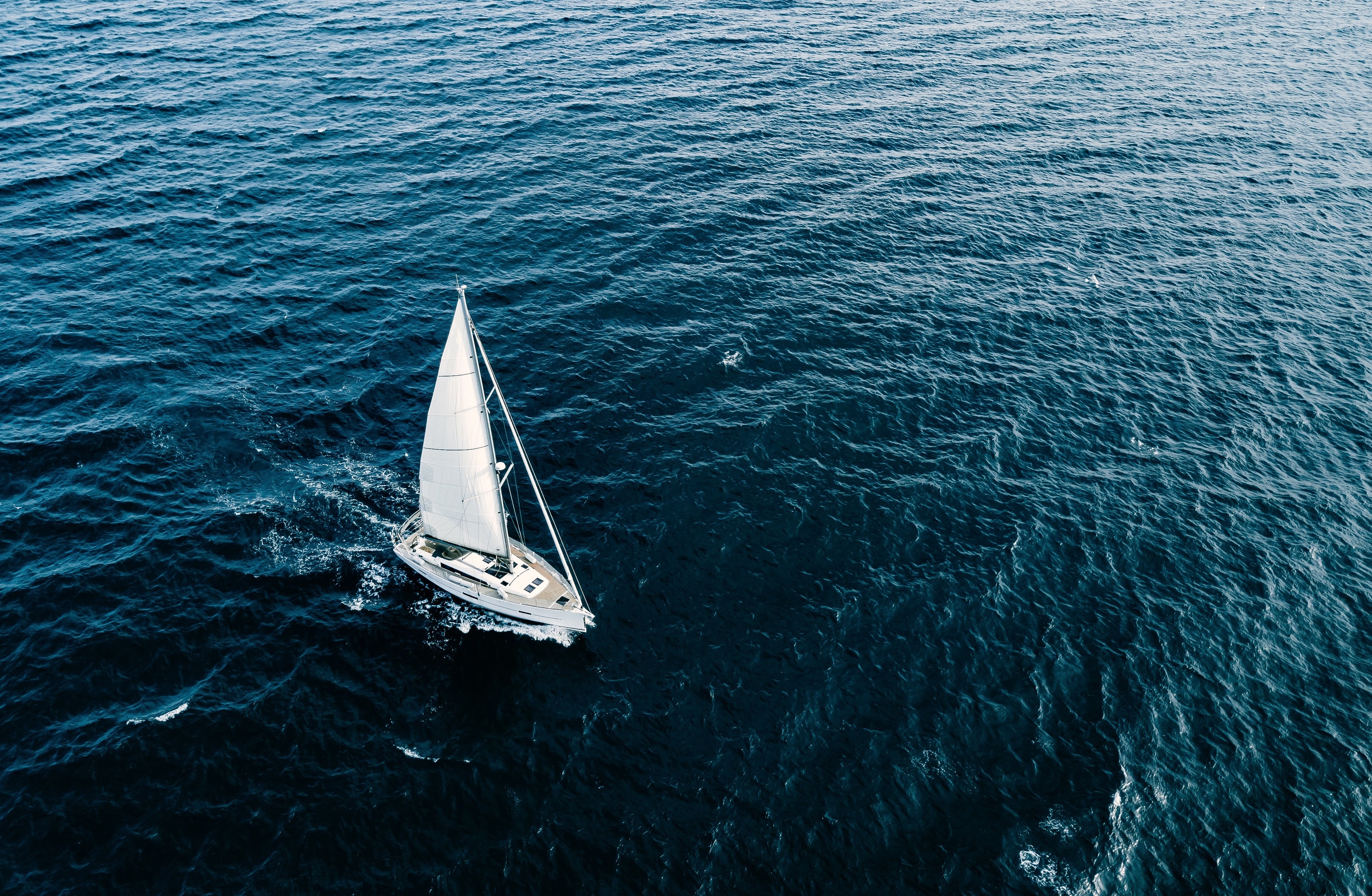 Photo: Sailboat motorsailing in the Ocean