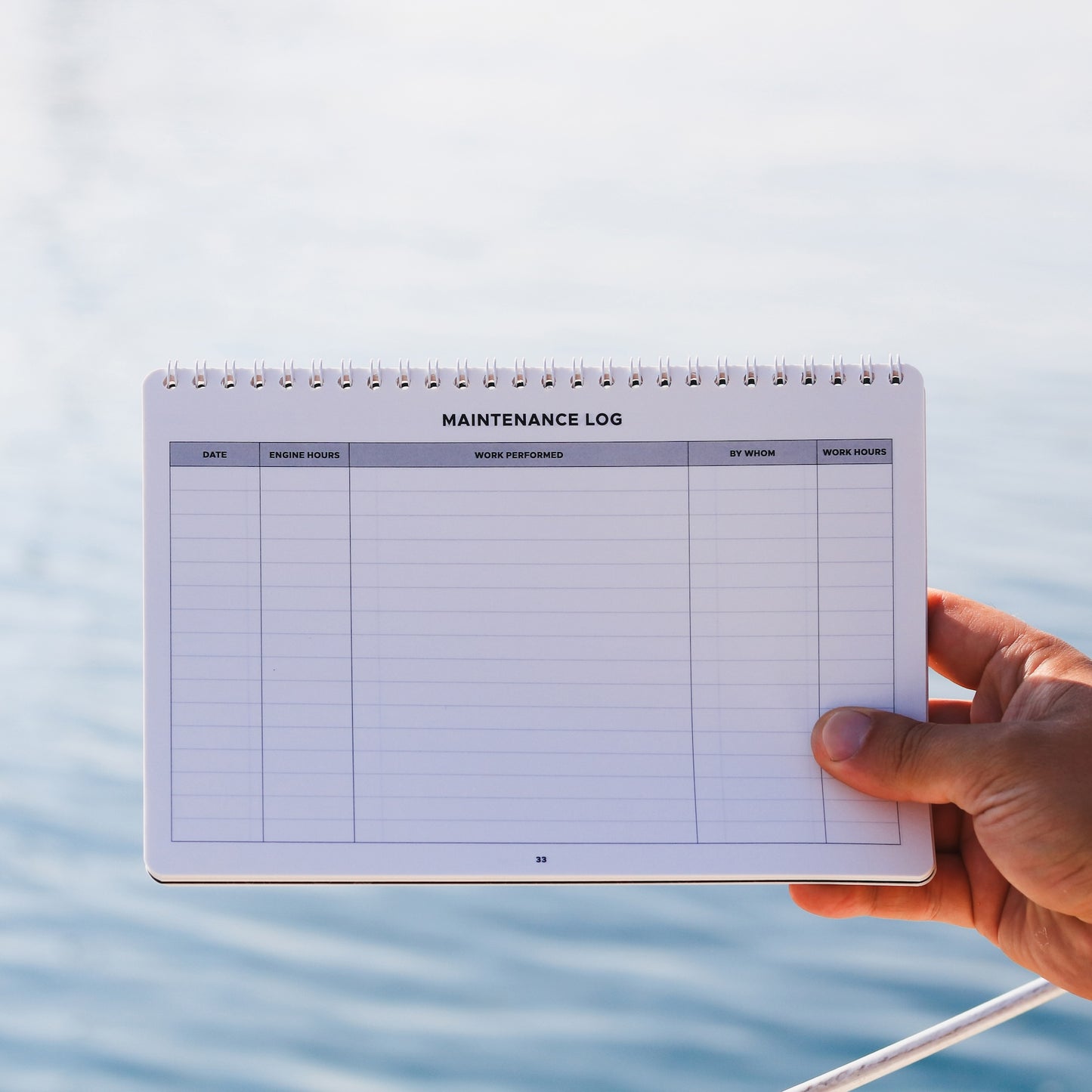 Boat engine maintenance log page with service entry fields.