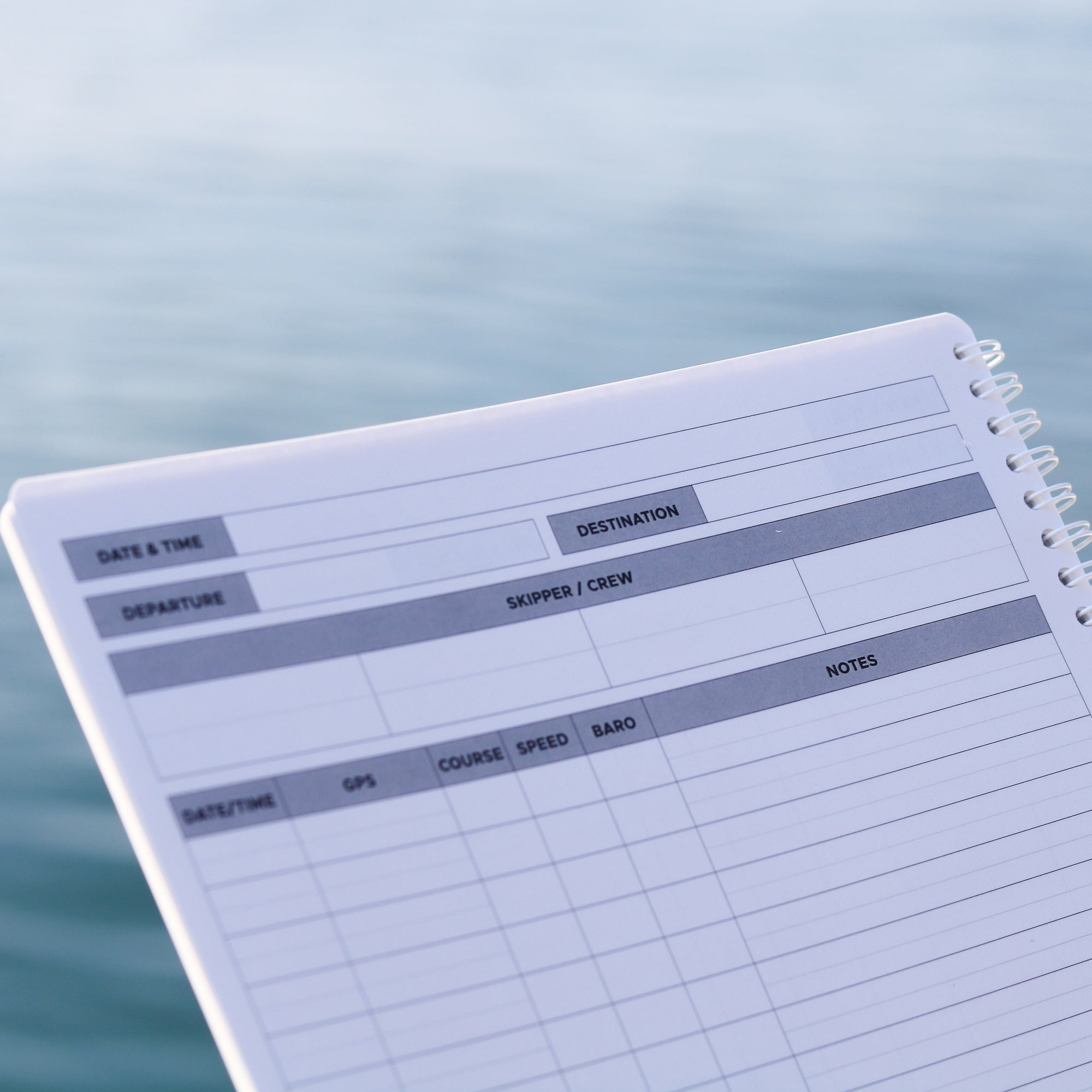 Close-up of updated sailing log pages showing GPS, speed, barometric pressure, and note fields.