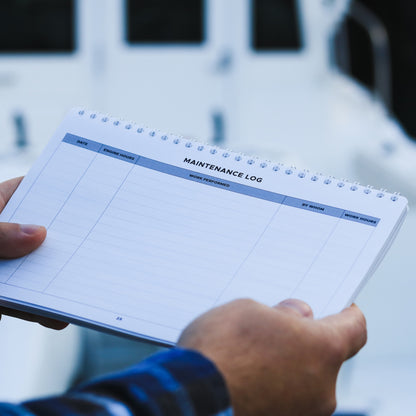 Boat engine maintenance log page with service entry fields.