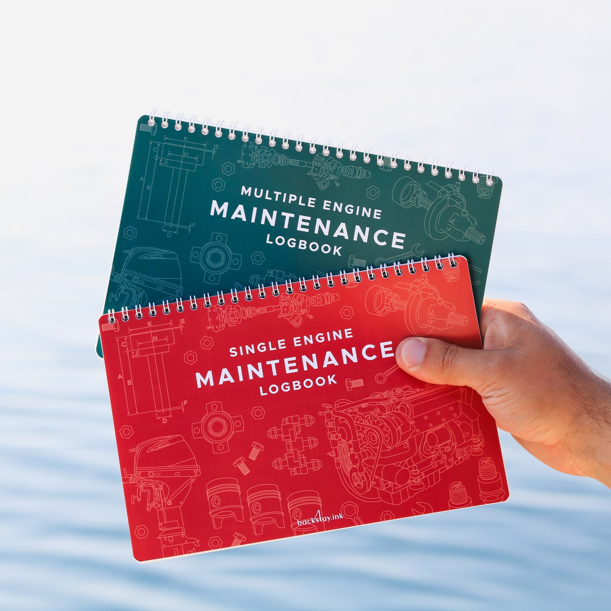 Marine engine maintenance logbooks for tracking service and repairs.