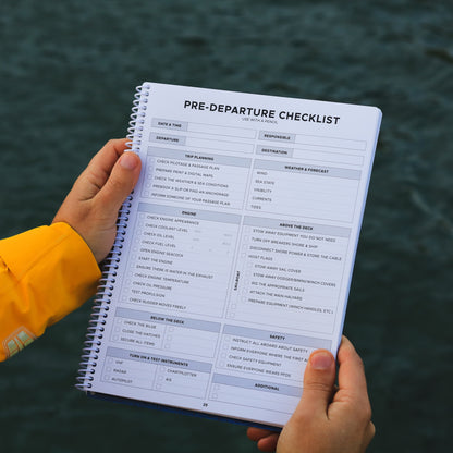 Pre-departure checklist page inside Backstay All-Weather Sailing Logbook with safety and engine checks.
