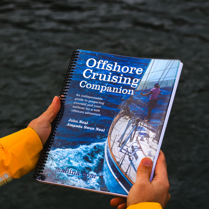 Offshore Cruising Companion book cover showing sailboat at sea, a comprehensive guide to preparing a sailboat for offshore adventure.