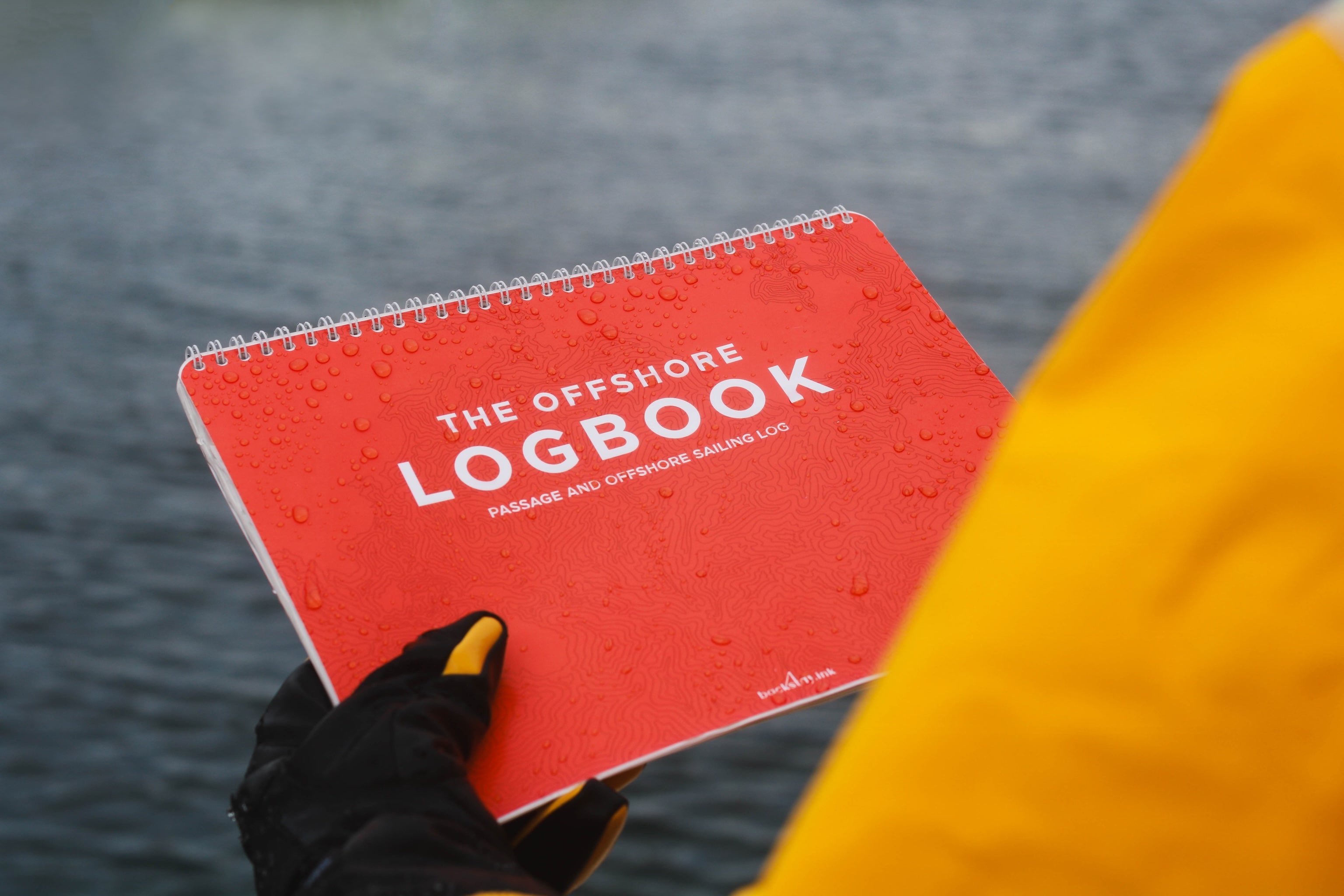 Photo: Water on waterproof offshore sailing logbook
