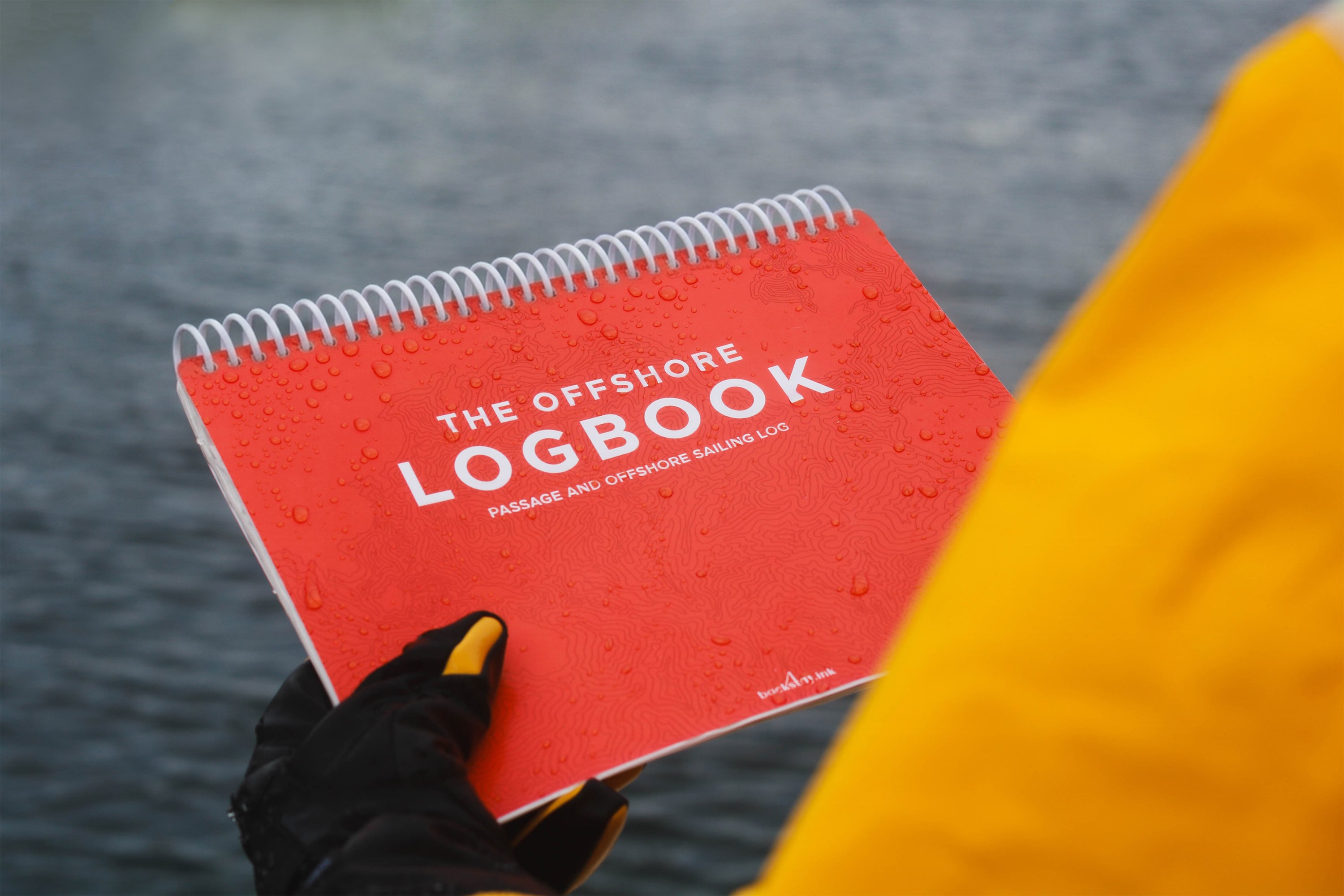 Water on waterproof offshore sailing logbook